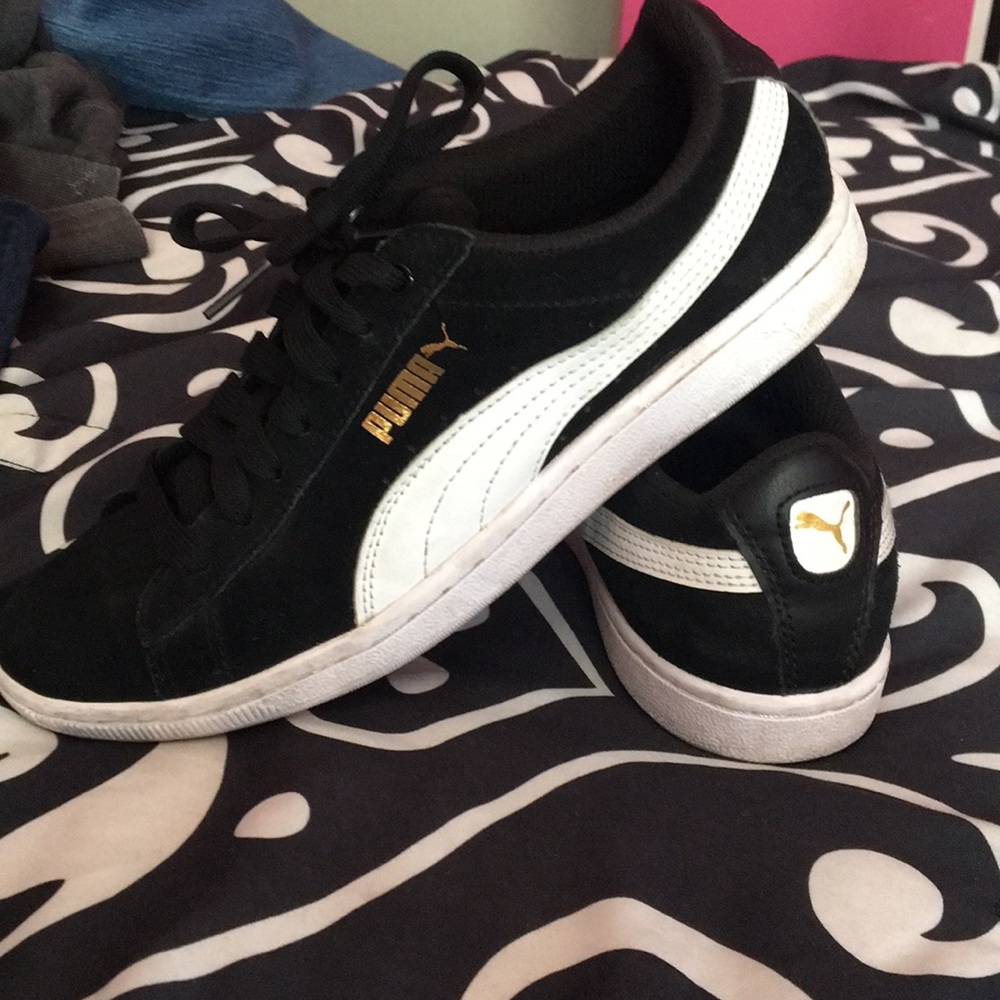 Black and white puma shoes